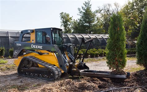 john deere skid steer with a attchmas|jd skid steer attachments.